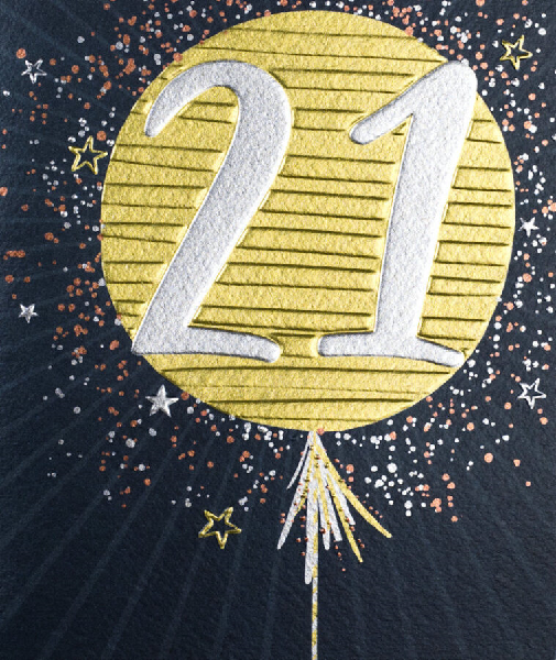 Black birthday card. A gold balloon with the number twenty-one in the middle of the card surrounded by smaller stars.