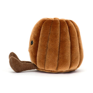 Side view of a Jellycat brown canelé shaped plush with a smiling face and brown feet on a white background. 