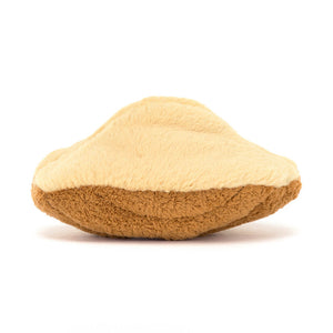 Back view of a Jellycat brown madeleine shaped plush on a white background. 