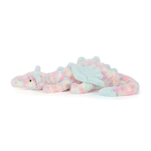 Side view of a Jellycat multicoloured dragon plush toy on a white background.