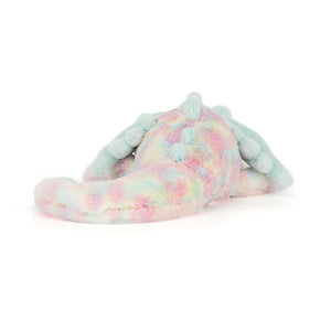 Back view of a Jellycat multicoloured dragon plush toy on a white background.