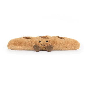 adorably soft plushie of a smiling baguette with legs by popular brand Jellycat.