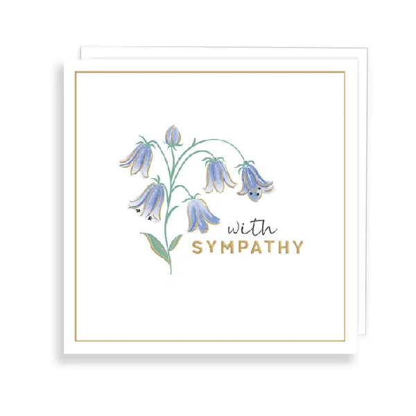 White sympathy card. Bluebells in the middle of the card with text "with sympathy" under it.