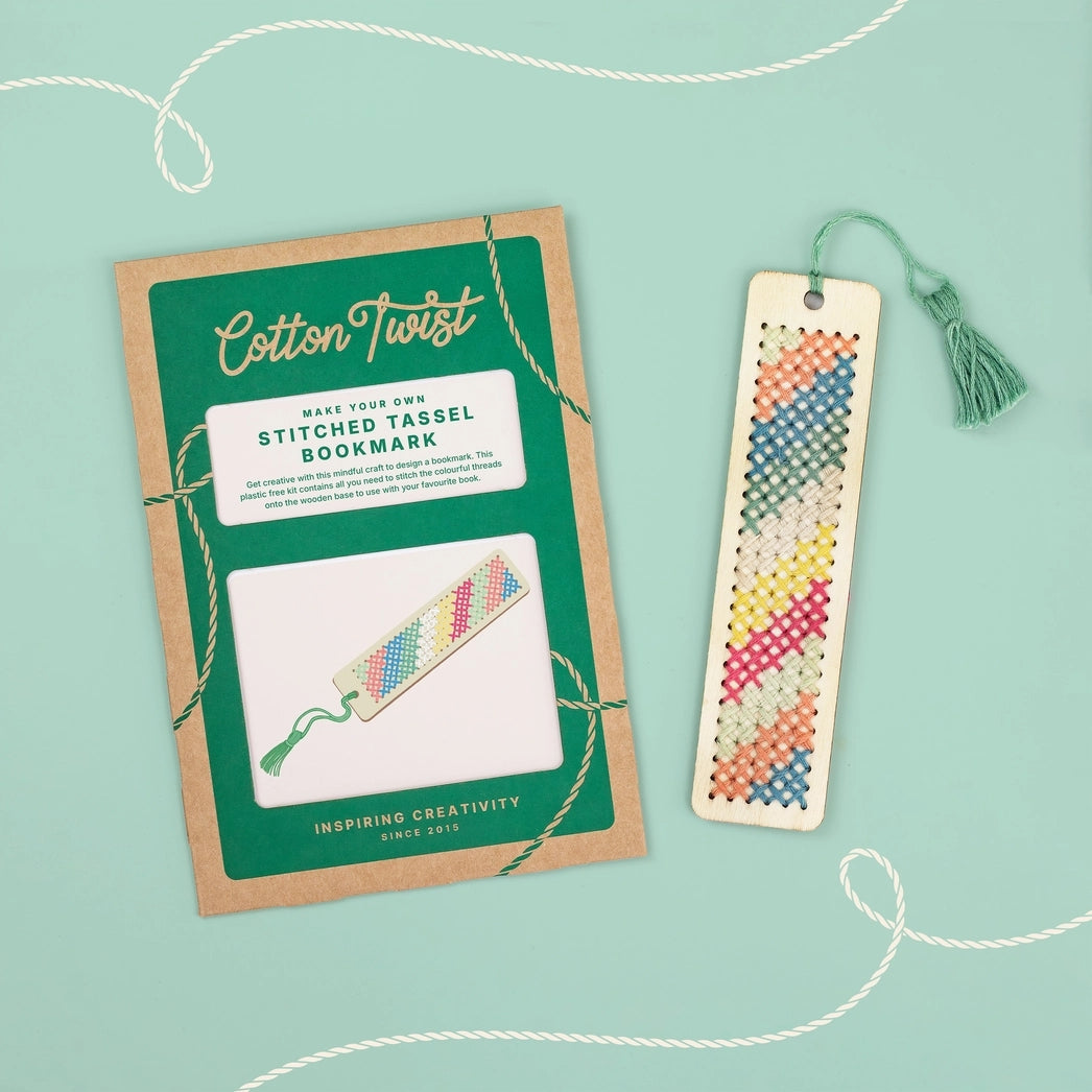 Cotton Twist stitched tassel bookmark kit with a completed bookmark on a light green background.