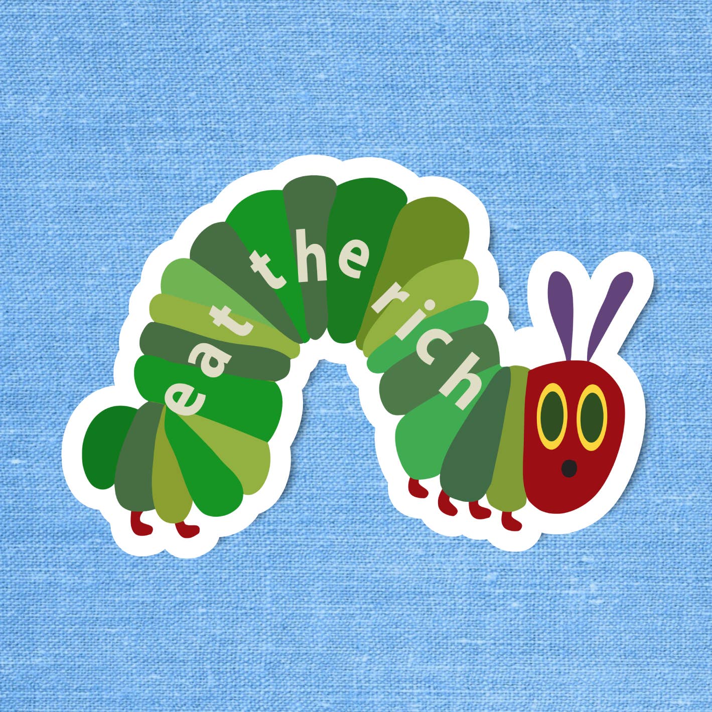 Sticker of a colourful caterpillar with the text 'eat the rich' printed on it. 