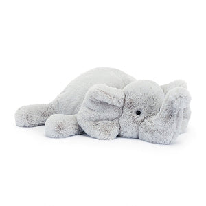 adorably soft plushie of a sleeping elephant by popular brand Jellycat.