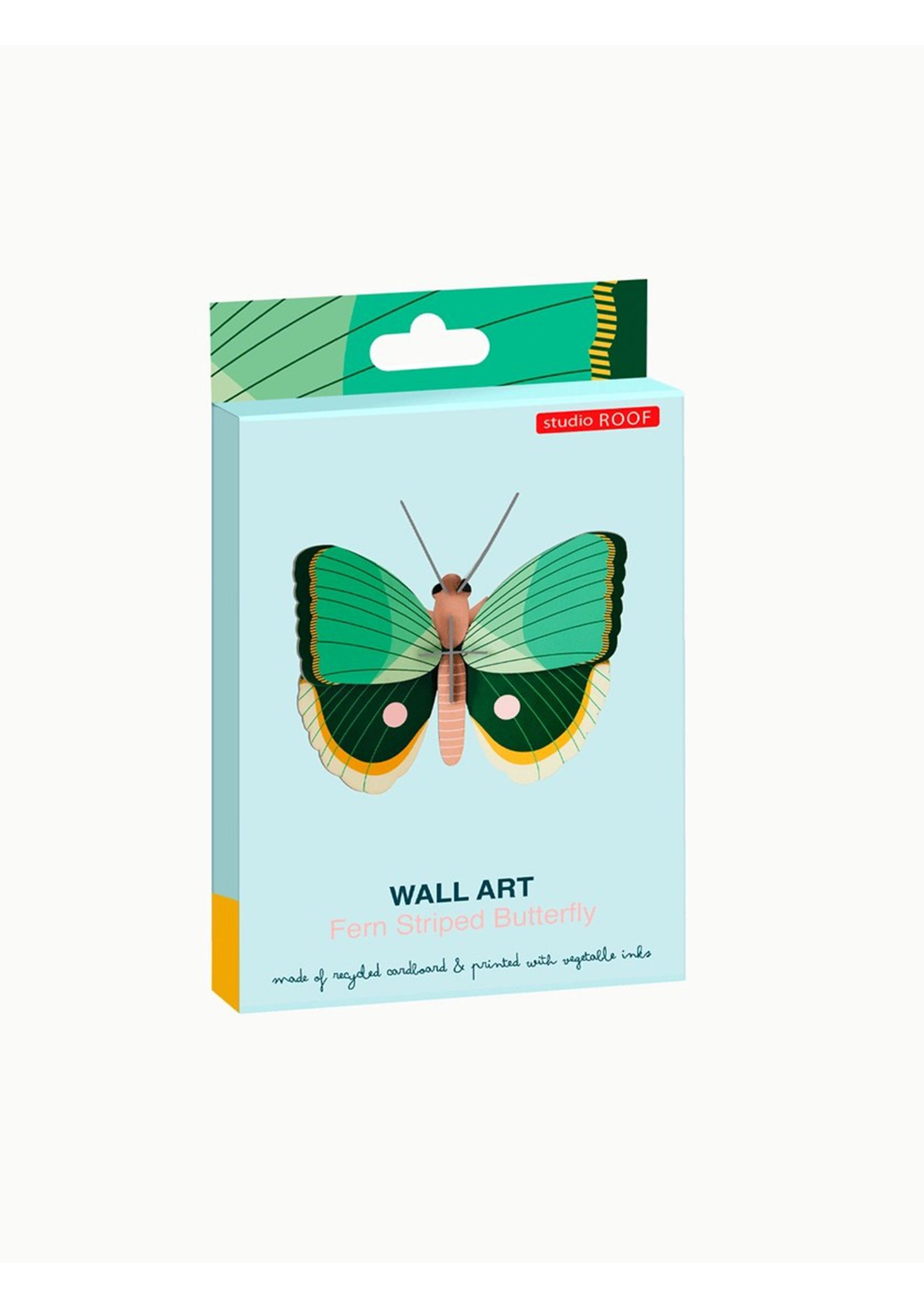 Packaging box for a fern striped butterfly wall art kit from Studio Roof. The box features an image of a green, yellow and white 3D butterfly on a blue background. 