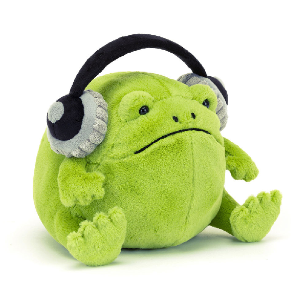 adorably soft plushie of a grumpy, chunky frog wearing black headphones by popular brand Jellycat.
