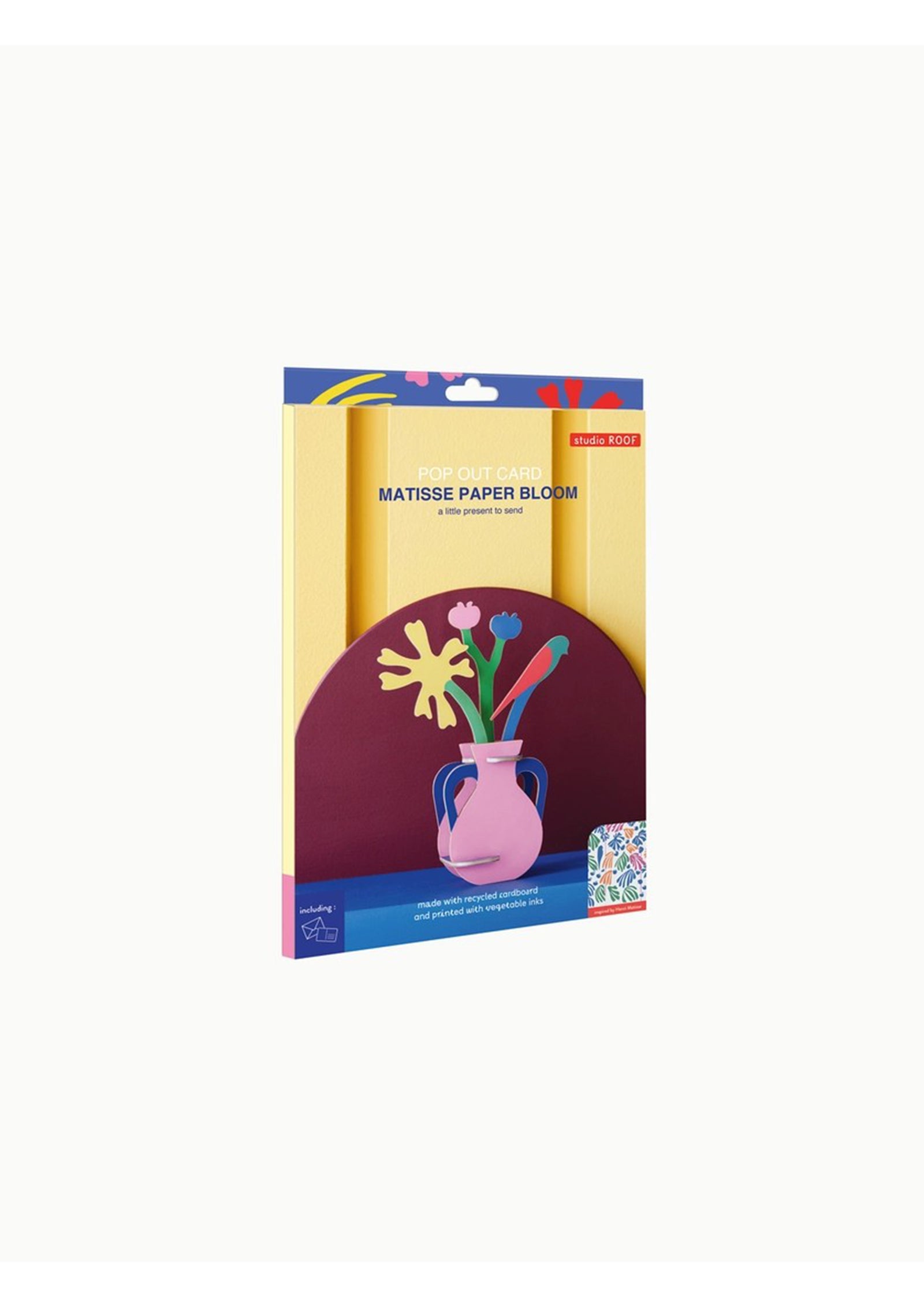 Packaging box for a Matisse Paper Bloom wall art kit from Studio Roof. The box features an image of a 3D model shaped like a pink vase with blue handles containing colourful flowers and a bird.