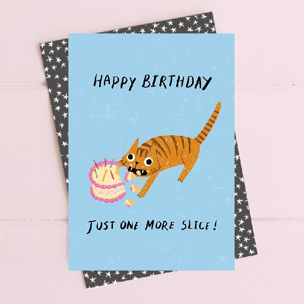 blue birthday card with a feral orange striped cat eating a birthday cake. top text read "happy birthday". bottom text reads "just one more slice!"