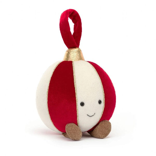adorably soft plushie of a smiling ornament ball with legs by popular brand Jellycat.