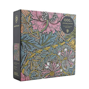 Muted colour, floral-patterned jigsaw puzzle box with 'paperblanks' branding on a white background.