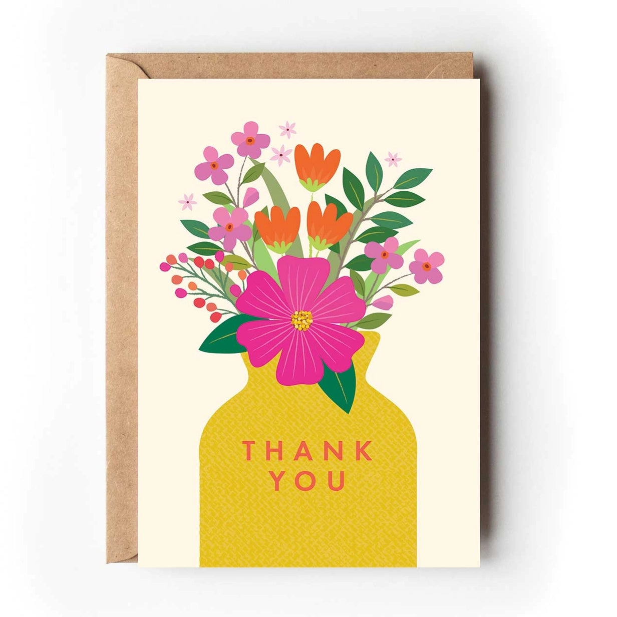 Greeting card featuring a colourful illustration of a vase containing flowers on a light background. The text 'Thank You' is printed on the vase. 