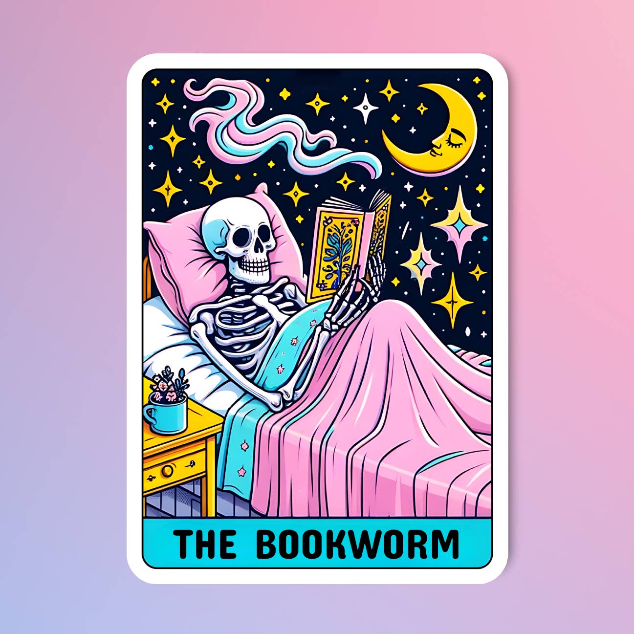 A tarot style sticker showing an illustration of a skeleton lying in bed under the covers. It reads a book and is surrounded by a dark backgorund sprinkled with stars and a moon. A table beside the bed holds a containrer filled with flowers. The text 'The Bookworm' is printed under the image. The sticker is on a pink and purple ombre background. 