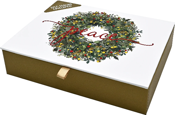 gold product box with a white cover. on it is a wreath with the word peace written in a cursive red font. peter pauper product