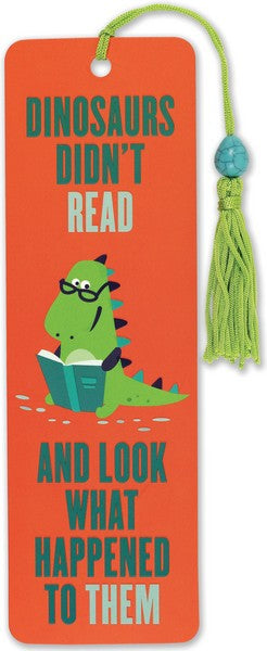 bright orange bookmark with a green string on a white background. illustration in the centre is a dinosaur with glasses and a book in hand eyeing the viewer. top text reads "dinosaurs didn't read". bottom text reads "and look what happened to them". peter pauper product