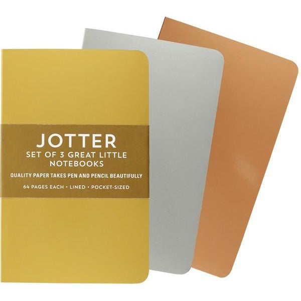 gold, silver, and bronze notebooks. brown band around the golden one has white text. text reads "jotter set of 3 great little notebooks. quality paper takes pen and pencil beautifully. 64 pages each, lined, pocket-sized"