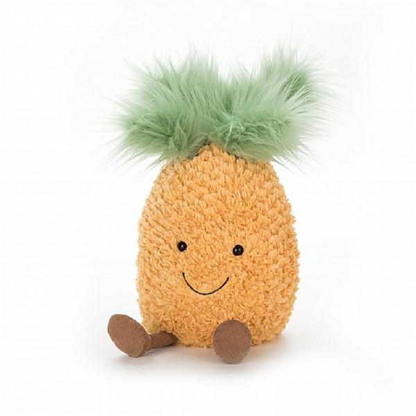 adorably soft plushie of a smiling pineapple by popular brand Jellycat.