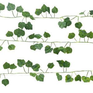 all-green ivy leaves string lights across a white background. kikkerland product