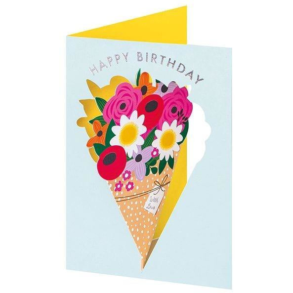 baby blue birthday card. the cover has "happy birthday" written at the top. the centre is a cutout shape of the design on the inside of the card: a cartoonish bouquet of flowers