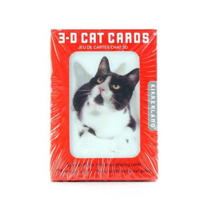 red playing cards packaging with a window revealing a black and white cat. top text reads "3-d cat cards". kikkerland product on white background.