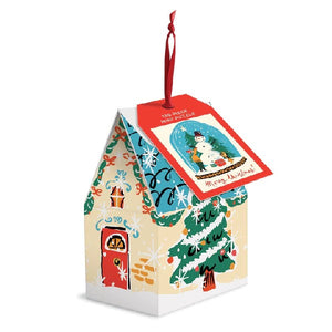 cute, pale yellow, blue, and red, Christmas-theme puzzle box in the shape of a house